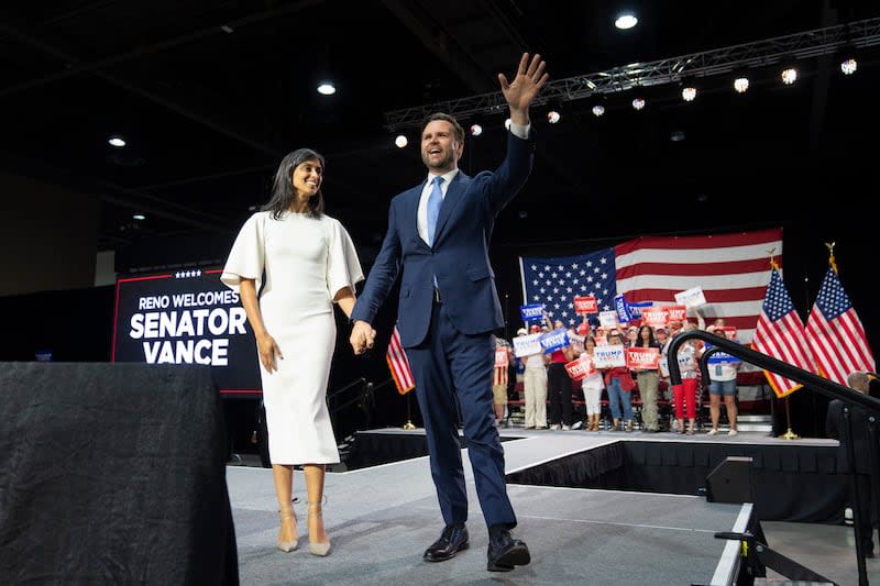 Accompanied by wife, Usha, Republican vice presidential candidate Sen. JD Vance, R-Ohio, waves toward the crowd at a campaign event in Reno, Nev., Tuesday, July 30, 2024. | Jae C. Hong