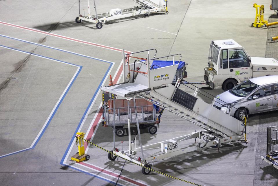 Gangways on the apron of the airport are empty in Cologne, Germany, Wednesday, Jan. 31, 2024. A union has called on security staff at most of Germany’s major airports to stage a one-day strike on Thursday as it steps up pressure on employers in a pay dispute. (Thomas Banneyer/dpa via AP)