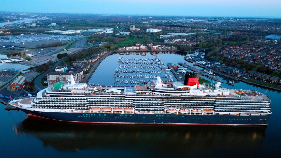 PHOTO: MS Queen Victoria cruise ship, operated by Cunard Line, is moored at the Royal Quays Marina in North Shields, after returning from Barbados, April 19, 2022. (Owen Humphreys/PA via AP)