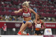 Emma Coburn, of the United States, competes in the final of the women's 3,000-meters steeplechase at the 2020 Summer Olympics, Wednesday, Aug. 4, 2021, in Tokyo. (AP Photo/Matthias Schrader)