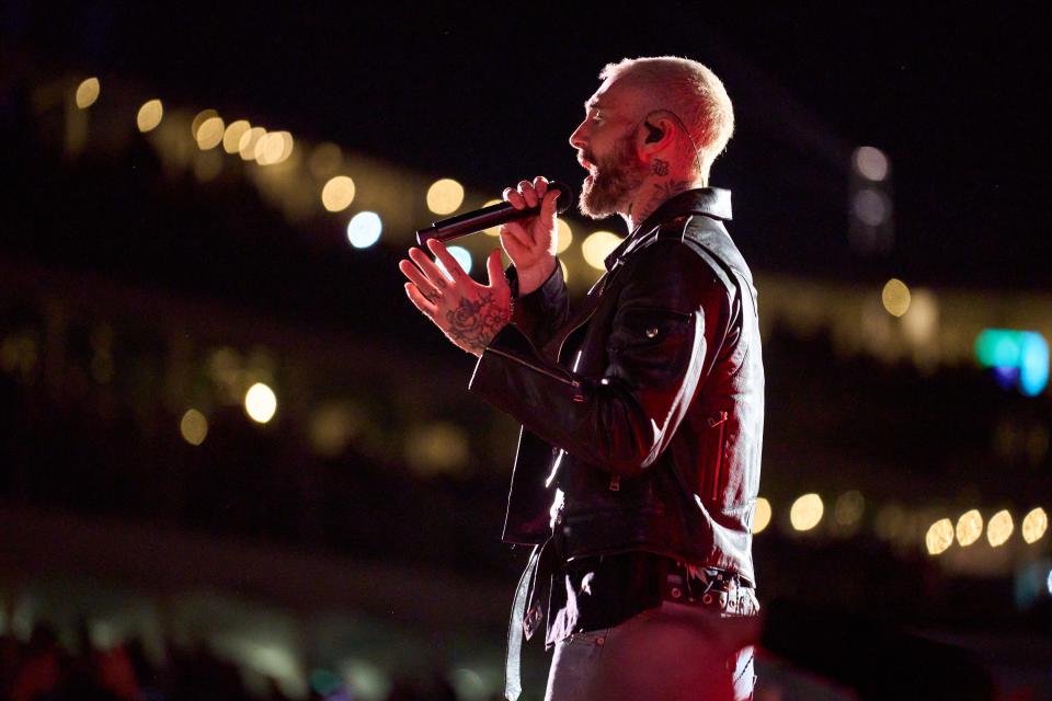 Adam Levine of Maroon 5 preforms on the stage in the 16th hole coliseum at TPC Scottsdale on Feb. 8, 2023.