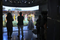 A model poses for a film pre-shot to be showcased online during Lotus make-up India Fashion week in New Delhi, India, Friday, Oct. 2, 2020. Unlike a fashion show, models aren't swaying live on a ramp. They are depending on digital technology to rescue their annual extravaganza from the coronavirus pandemic with ''Phygital edition." India’s first digital fashion week is being held from Oct. 14-18, live streaming the spring-summer collections by more than 40 fashion designers. (AP Photo/Manish Swarup)