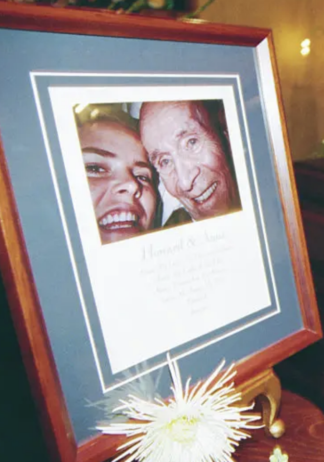 a sweet framed photo of the couple smiling