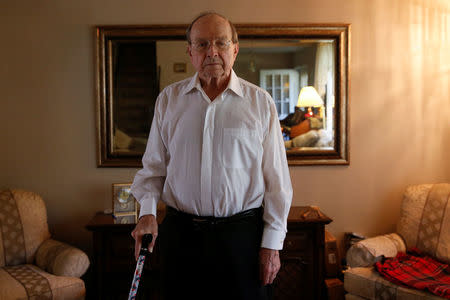 Roland Gilbert, a blind 86-year-old Franklin County resident, stands for a portrait at his home in Columbus, Ohio U.S., October 28, 2016. REUTERS/Shannon Stapleton