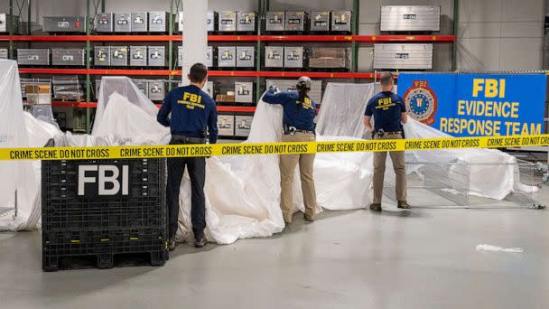 PHOTO: FBI Special Agents assigned to the Evidence Response Team process material recovered from the High Altitude Balloon recovered off the coast of South Carolina. The material was processed and transported to the FBI Laboratory in Quantico, VA. (FBI)