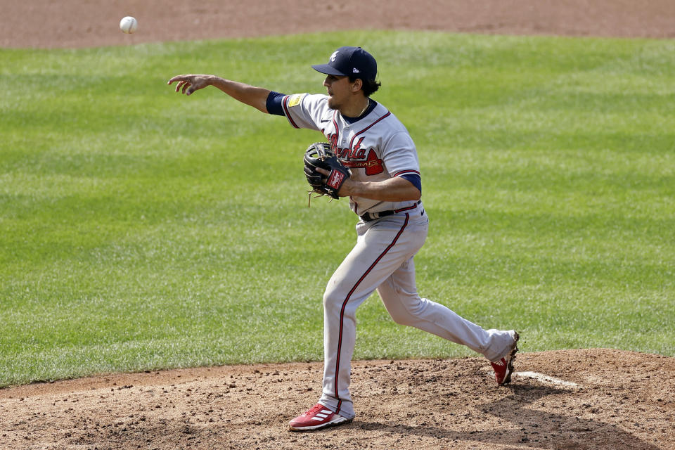 Atlanta Braves' Nicky Lopez throws against the New York Mets during the ninth inning in the first baseball game of a doubleheader on Saturday, Aug. 12, 2023, in New York. The Braves won 21-3. (AP Photo/Adam Hunger)