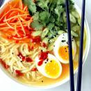 <p>Transform canned chicken noodle soup by adding fresh ginger, crunchy vegetables, herbs and a jammy soft-boiled egg. Look for a low-sodium soup that has 450 mg sodium or less per serving.</p> <p> <a href="https://www.eatingwell.com/recipe/269887/spicy-chicken-noodle-soup-with-soft-boiled-eggs/" rel="nofollow noopener" target="_blank" data-ylk="slk:View Recipe;elm:context_link;itc:0;sec:content-canvas" class="link ">View Recipe</a></p>