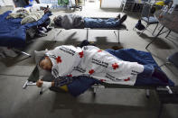 <p>Residents sleep inside the Dingman Township Volunteer Fire Department in Dingman Township, Pa., on March 7, 2018, during the second snowstorm that hit the region in northeastern Pennsylvania in less then a week. (Photo: Butch Comegy/The Scranton Times-Tribune via AP) </p>