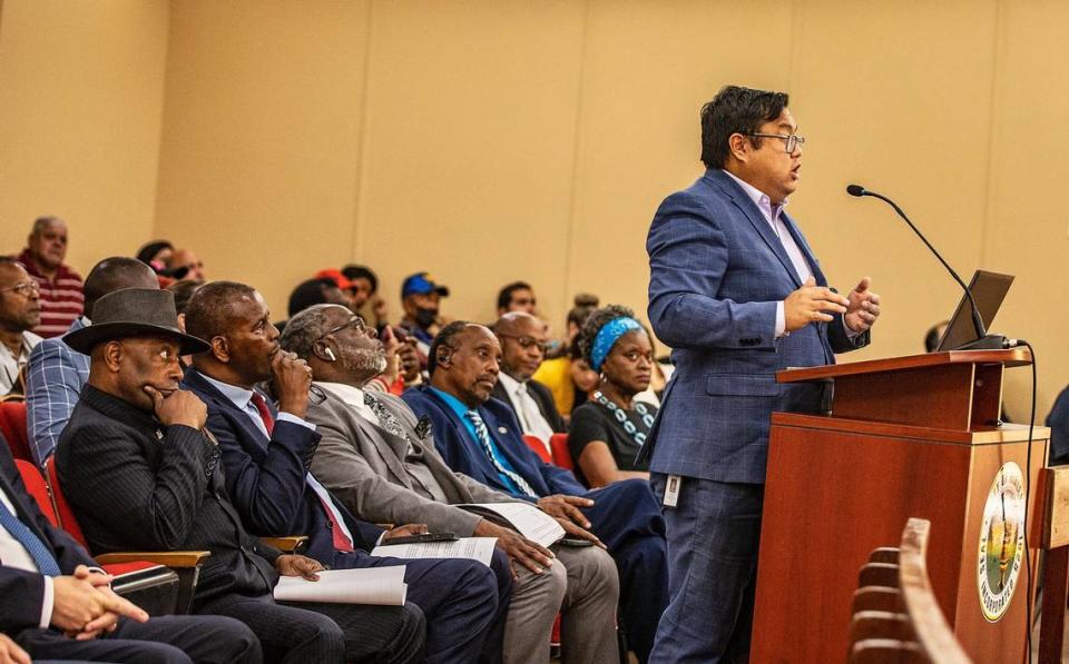 Edward Ng, Interim Director with the Corroding Group, leads an annexation report presentation during a tense council meeting to discuss a possible annexation by the City of Hialeah of part of Brownsville, a historic Black neighborhood in Miami-Dade County, on Tuesday April 25 2023.