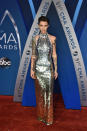 <p>The actress sticks to her edgy roots in a sparkling metallic halter dress. (Photo: Getty Images) </p>