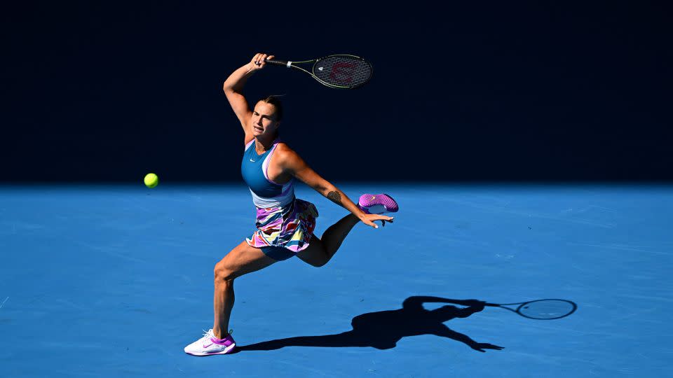 Sabalenka plays a forehand in her singles match against Belinda Bencic at the 2023 Australian Open. - Quinn Rooney/Getty Images