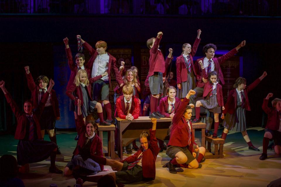 Matilda's classmates rally on stage at the Cotuit Center for the Arts' production of "Matilda the Musical," based on Roald Dahl's book about a whip-smart little girl who just wants love from her parents.