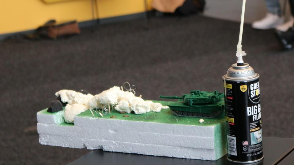 A diorama model depicts a proposed technique for crossing anti-tank ditches — foam bridges — developed at the 3rd Infantry Division and Georgia Tech's joint innovation 