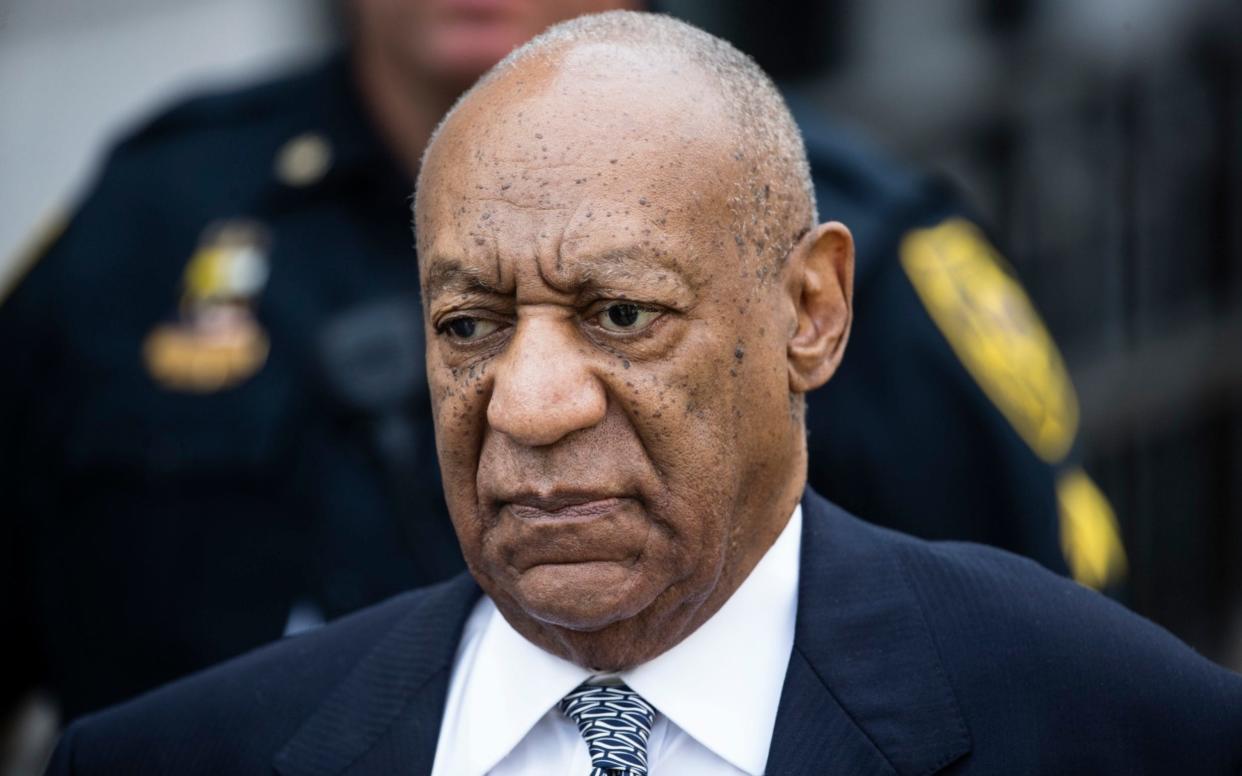 Bill Cosby, arriving at the courtroom in Norristown, a suburb of Philadelphia, for his re-trial on charges of sexual assault - AP