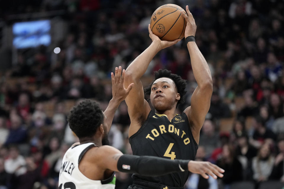 Toronto Raptors forward Scottie Barnes (4) shoots over Minnesota Timberwolves guard Mike Conley (10) during the first half of an NBA basketball game, in Toronto, Saturday, March 18, 2023. (Frank Gunn/The Canadian Press via AP)