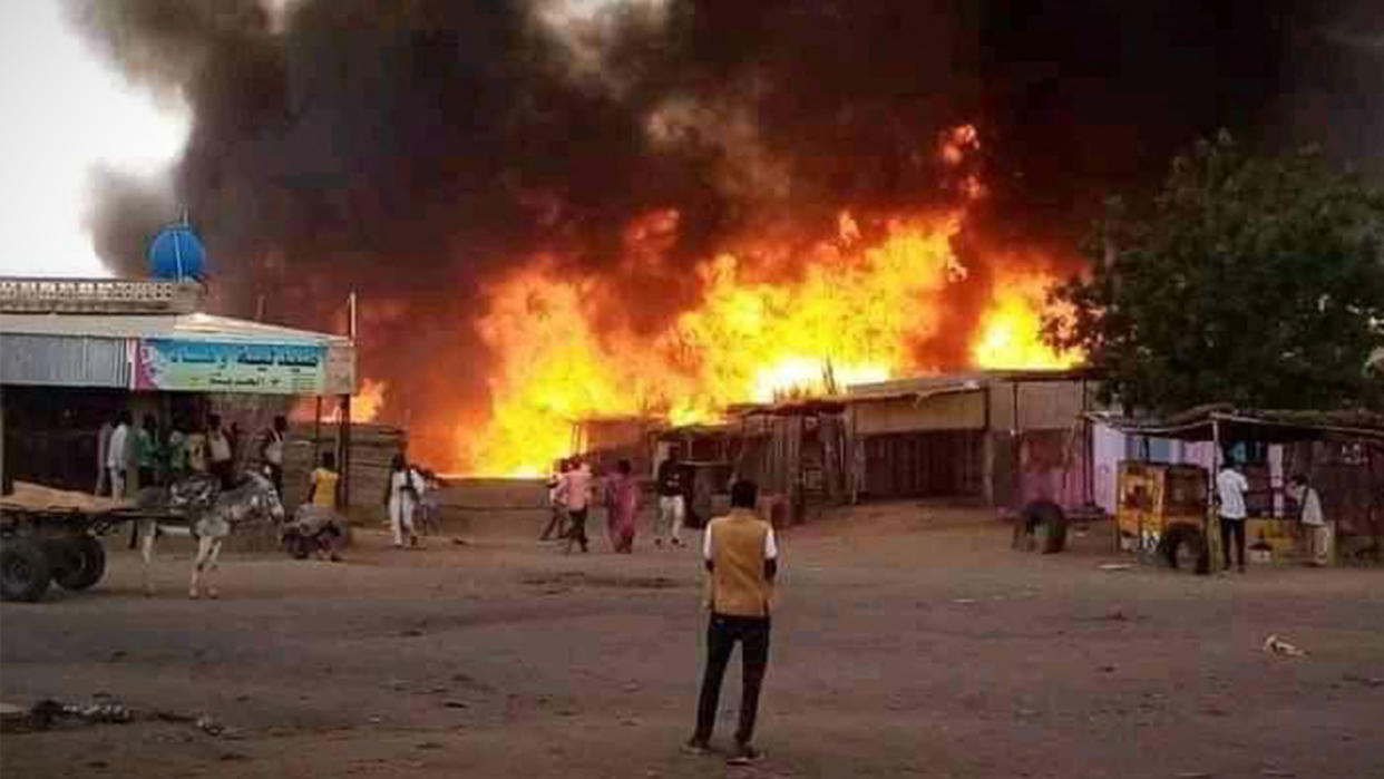  Fire at a livestock market in Darfur, Sudan. 