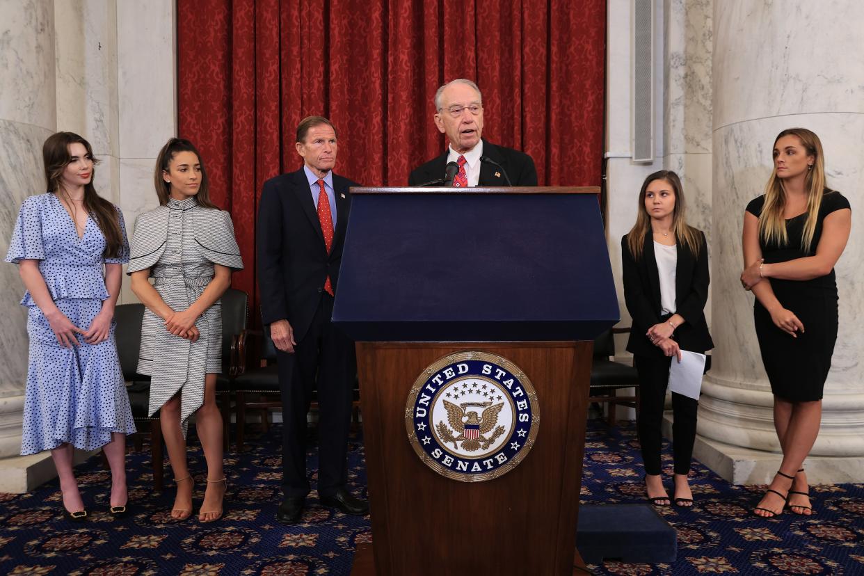 WASHINGTON, DC - SEPTEMBER 15: (L-R) Former U.S. Olympic gymnast McKayla Maroney, national champion Jessica Howard, Olympian Aly Raismam, Sen. Richard Blumenthal (D-CT), Sen. Charles Grassley (R-IA), gymnast Kaylee Lorincz and NCAA and world champion gymnast Maggie Nichols hold a news conference in the Russell Senate Office Building following the gymnasts' testimony before the Senate Judiciary Committee on September 15, 2021 in Washington, DC. Maroney, Raisman and Nichols testified about the abuse they experienced at the hands of Larry Nassar, the now-imprisoned U.S. women's national gymnastics team doctor, and the Federal Bureau of Investigation’s lack of urgency when handling their cases.