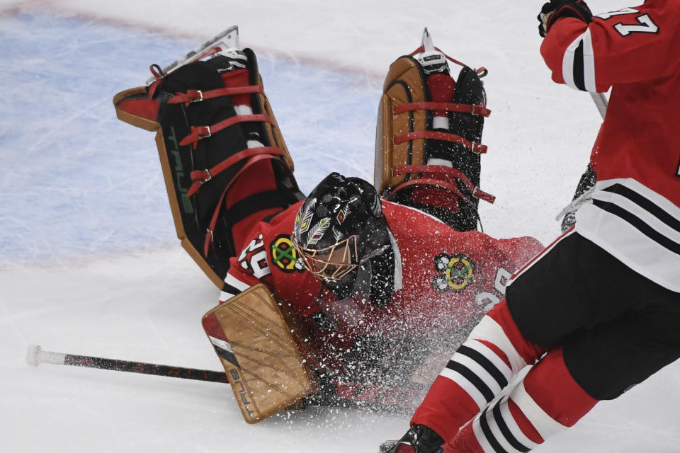 Chicago Blackhawks goaltender Marc-Andre Fleury (29) makes a save during the second period of an NHL hockey game against the Tampa Bay Lightning, Sunday, March 6, 2022, in Chicago. (AP Photo/Matt Marton)