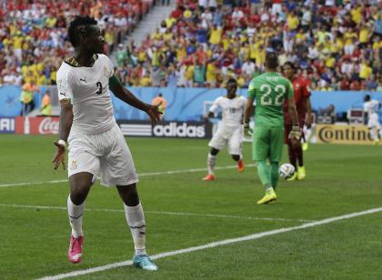 Asamoah Gyan celebrates after scoring Ghana's only goal against Portugal. (AP)