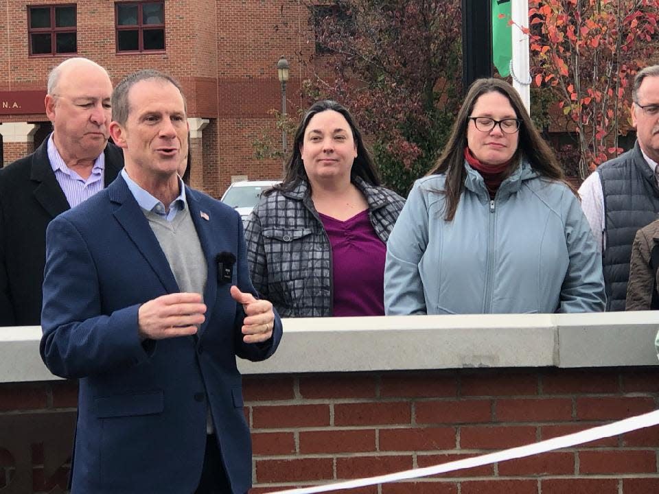 Hornell Mayor John Buckley speaks during an event marking the official debut of Union Square Park Thursday, Nov. 2, 2023 as Deputy Mayor Jessica Cleveland and City Planner Heather Reynolds look on.