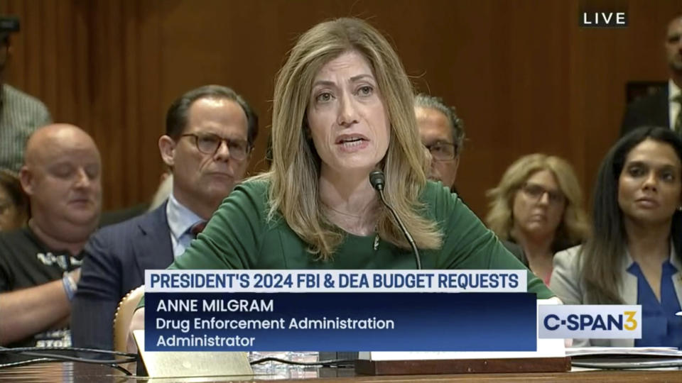 FILE - In this image from video provided by C-SPAN, U.S. Drug Enforcement Administration Administrator Anne Milgram speaks during a hearing before the Senate Appropriations Subcommittee on Commerce, Justice, and Science in Washington on May 10, 2023. At center left behind Milgram is Louis Milione. Milione’s four years of consulting for Big Pharma preceded his 2021 return to the DEA to serve as Milgram’s top deputy, renewing concerns in the agency and beyond about the revolving door between government and industry and its potential impact on the DEA’s mission to police drug companies blamed for tens of thousands of American overdose deaths. (C-SPAN via AP)