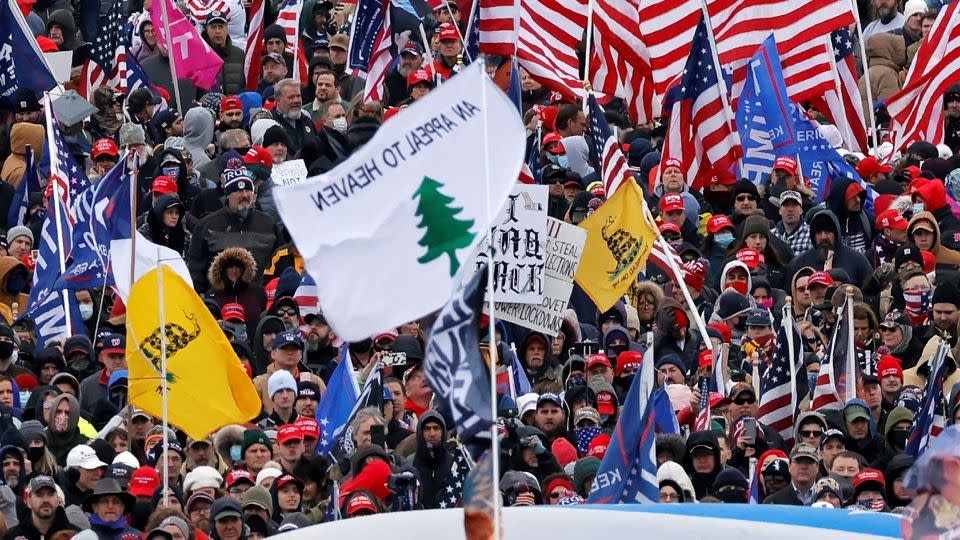 An "Appeal to Heaven" flag is seen among a crowd of supporters of President Donald Trump in Washington, D.C. on January 6, 2021. - Carlos Barria/Reuters/File