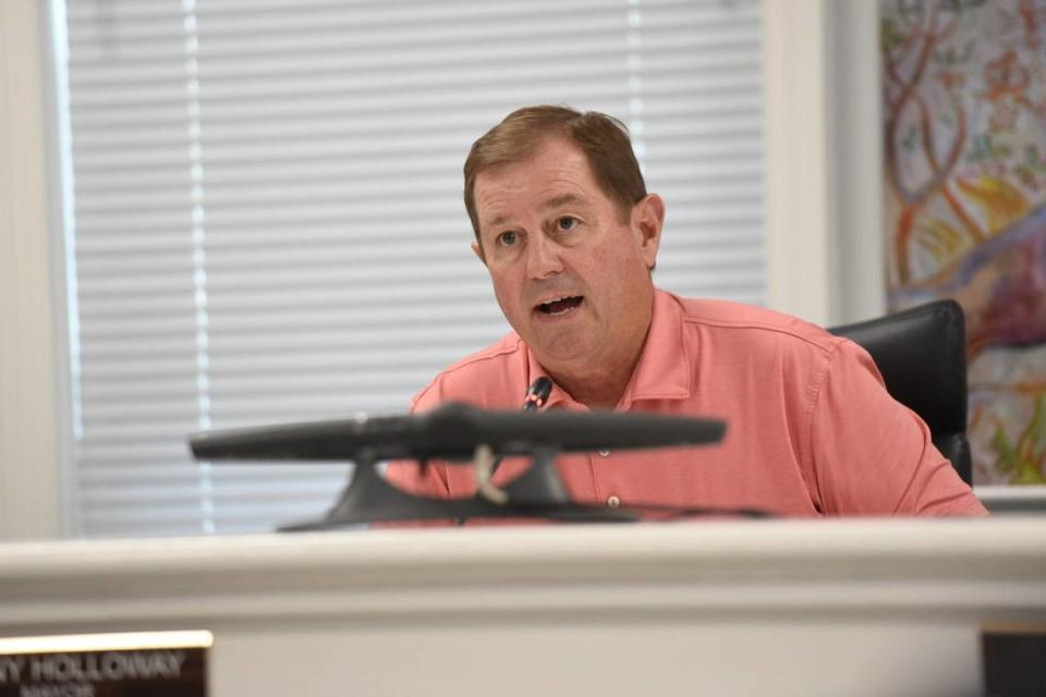 Ocean Springs Mayor Kenny Holloway speaks during a special city council meeting at City Hall on Tuesday, May 9, 2023, following a shooting at one of the city’s businesses on Friday night.