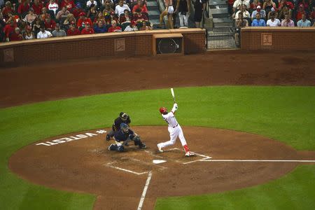 Jun 11, 2018; St. Louis, MO, USA; St. Louis Cardinals first baseman Jose Martinez (38) hits a two run home run off San Diego Padres starting pitcher Jordan Lyles (not pictured) during the third inning at Busch Stadium. Mandatory Credit: Jeff Curry-USA TODAY Sports