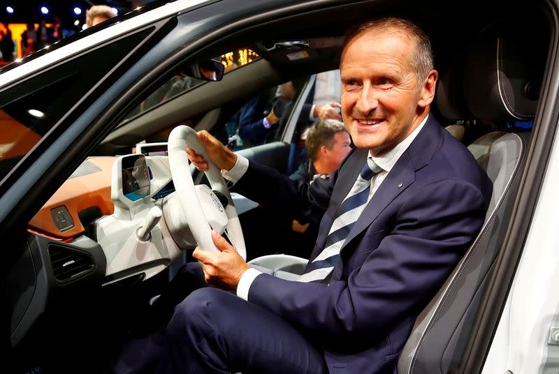 FILE PHOTO: Herbert Diess, CEO of German carmaker Volkswagen AG, poses in an ID.3 pre-production prototype