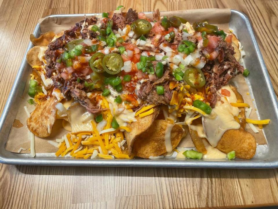 The smoked nachos at O.G. Bandits come topped with pulled pork, chopped brisket and smoked chicken.