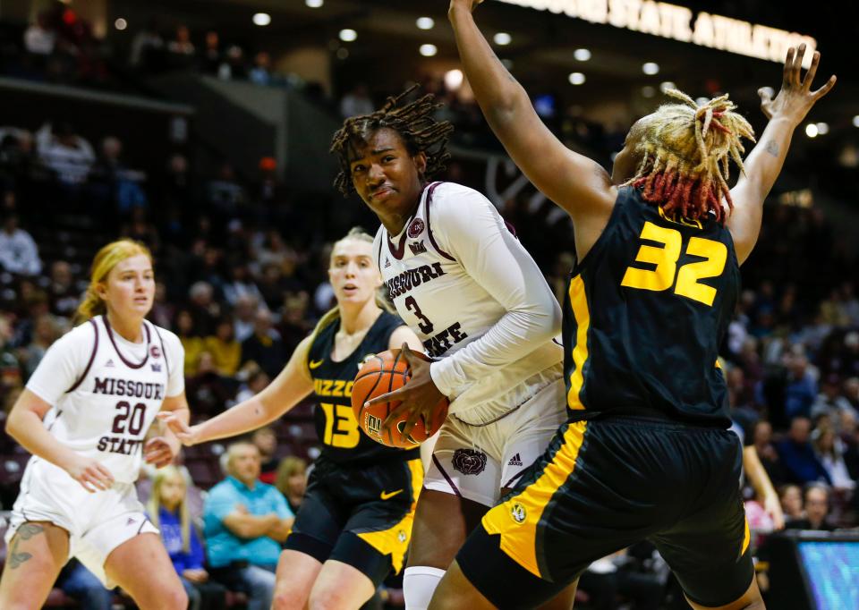 Missouri State Lady Bears forward Kennedy Taylor drives around Mizzou's Jayla Kelly during a game at GSB Arena on Monday, Nov. 7, 2022.