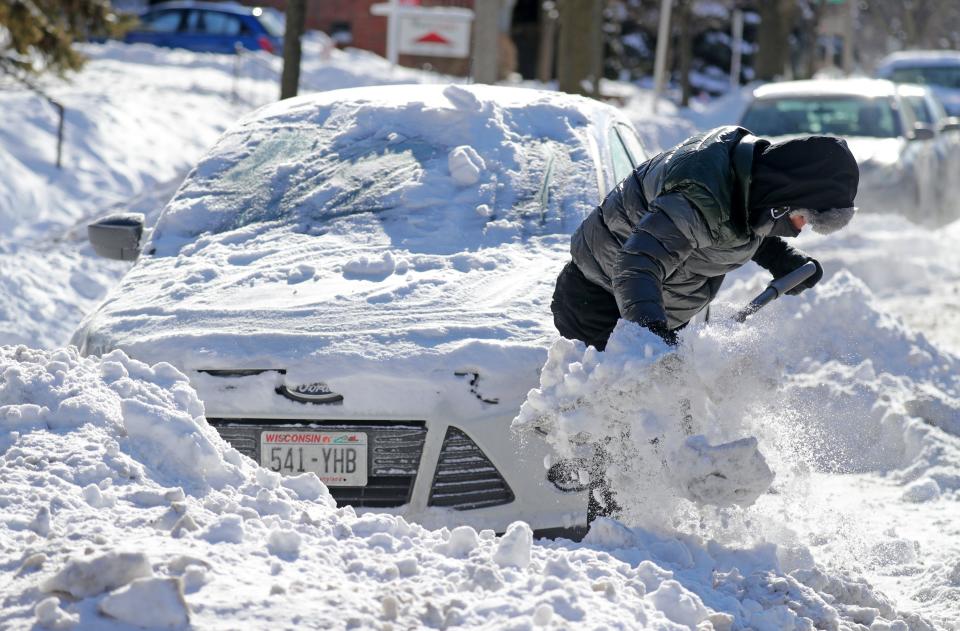 Israel Montelongo, a University Of Wisconsin Milwaukee student, from Delevan, WI. Works to shovel out his car on North Oakland Avenue just north of East Hartford Avenue in Milwaukee on Wednesday, Jan. 30, 2019. The National Weather Service in Sullivan issued it's first wind chill warning in five years, as schools, businesses and governments announced closures. A polar vortex is funneling extremely cold air from the North Pole right into Wisconsin. Milwaukee and southeastern Wisconsin were being hit head-on by the polar vortex Wednesday morning. The temperature was minus 18 degrees and the wind chill was minus 46 in Milwaukee. Wind chills hit minus 51 in Sheboygan, minus 50 in Waukesha and minus 47 at Timmerman Field in Milwaukee early Wednesday, according to the National Weather Service.