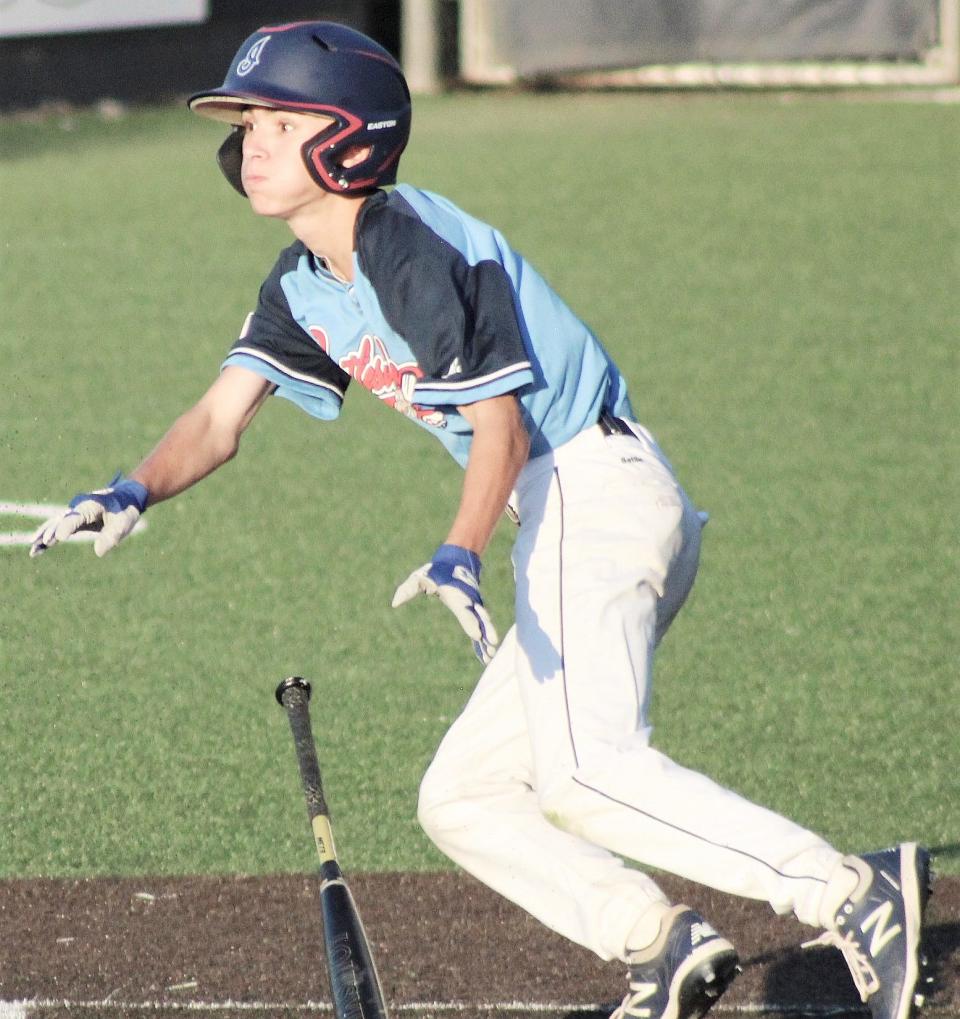 Luke Fox reacts after dropping down a bunt for the Bartlesville Doenges Ford Indians during 2021 summer baseball action.