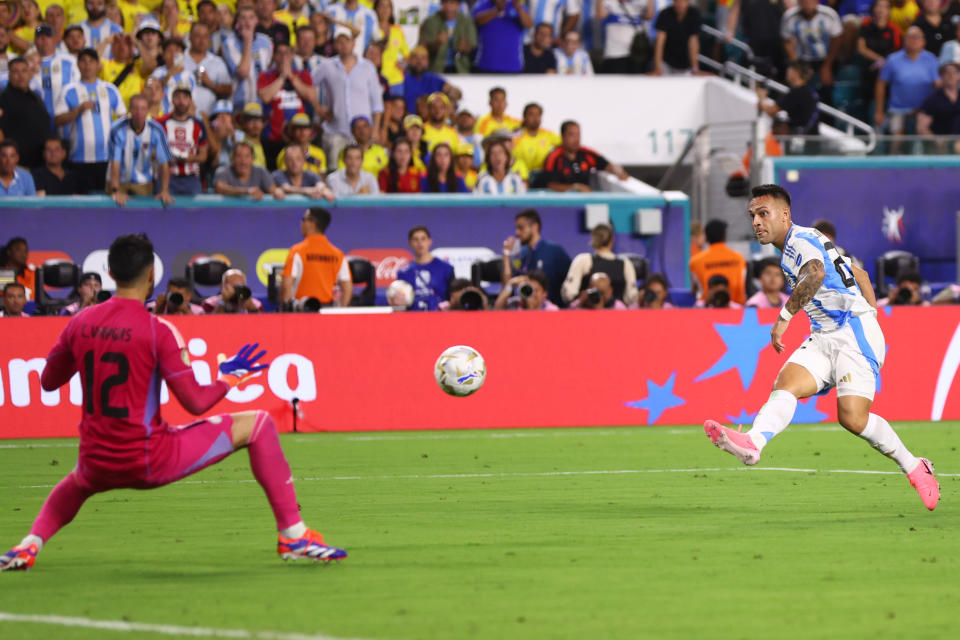 MIAMI GARDENS, FLORIDA - JULY 14: Lautaro Martinez of Argentina scores the team's first goal during the CONMEBOL Copa America 2024 Final match between Argentina and Colombia at Hard Rock Stadium on July 14, 2024 in Miami Gardens, Florida. (Photo by Maddie Meyer/Getty Images)