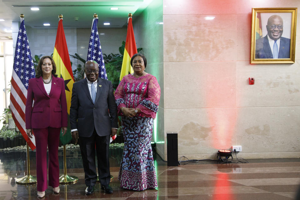U.S. Vice President Kamala Harris, left, is welcomed by Ghana President Nana Akufo-Addo, centre and his wife Rebecca Griffiths-Randolph, in Accra, Ghana, Monday March 27, 2023. Harris is on a seven-day African visit that will also take her to Tanzania and Zambia. (AP Photo/Misper Apawu)