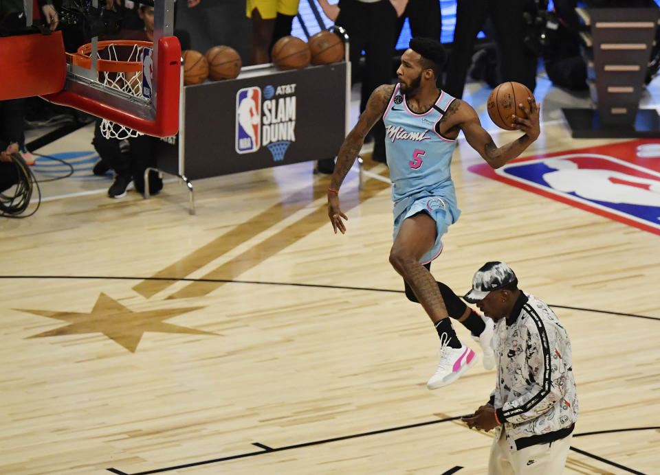 Miami Heat forward Derrick Jones, Jr. edged out Orlando Magic star Aaron Gordon to win the Slam Dunk Contest on Saturday night at the United Center.