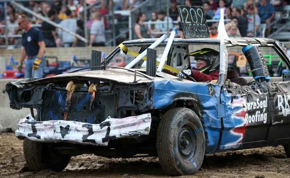 Scott Wobster of Monroe, manuevers during Heat #2 at the Monroe County Fair Demolition Derby Tuesday evening.