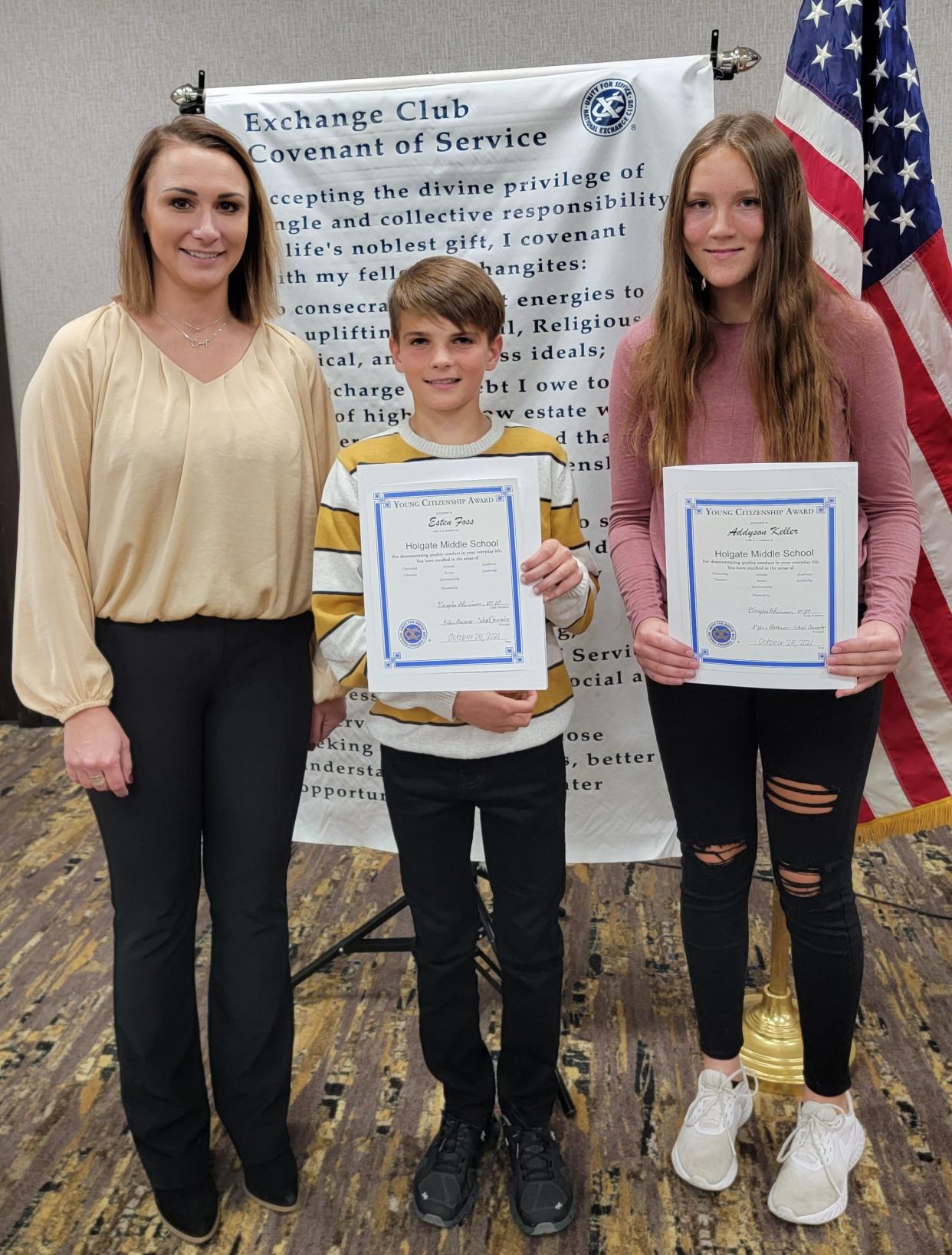 Courtney Hostetter, youth awards chairwoman for the Exchange Club, left, presents Holgate Middle School eighth graders Esten Foss and Addyson Keller with the October 2021 Youth Citizenship Awards from the Exchange Club of Aberdeen. The award recognized pre-high school students who demonstrate good citizenship at school and at home. The students are chosen by their teachers and counselors.