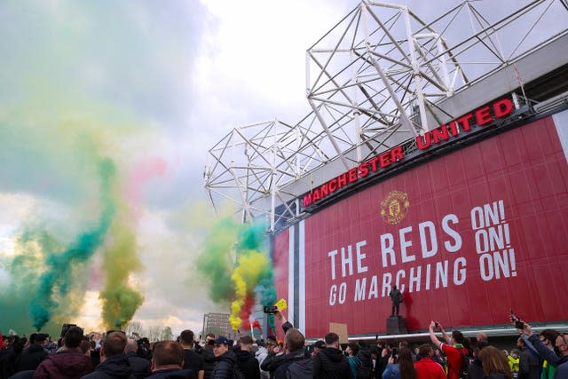 Manchester United fans protest against the club’s owners ahead of the scheduled fixture against rivals Liverpool. Anger over the proposed European Super League reignited long-standing opposition of the Glazer family, with hundreds of supporters managing to enter Old Trafford and get on to the pitch, forcing the postponement of the behind-closed-doors contest