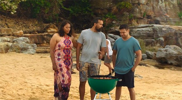 The ad starts off with three people lighting up the barbecue. Photo: Youtube/WeLoveOurLamb