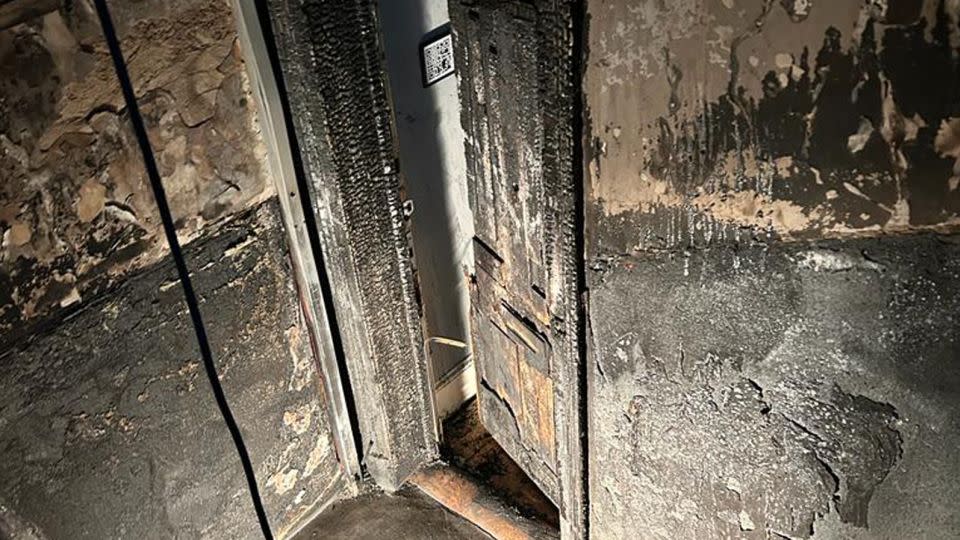 Fire damage is shown at the Glasgow tenement block where Carina Haouchine used to live. - Carina Haouchine