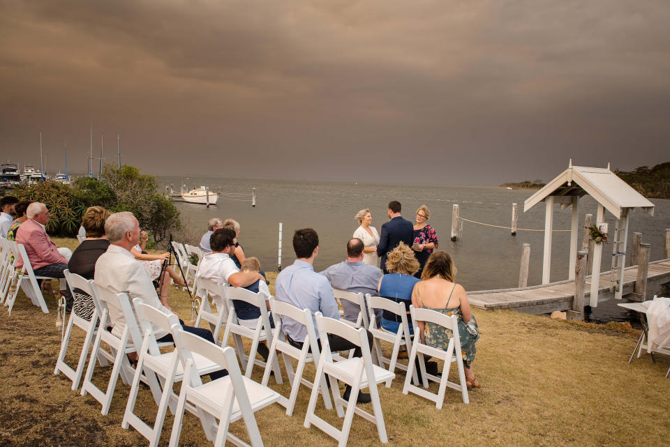 The couple are seen saying "I do" in front of their 22 guests. Source: Rebecca Farley Photography