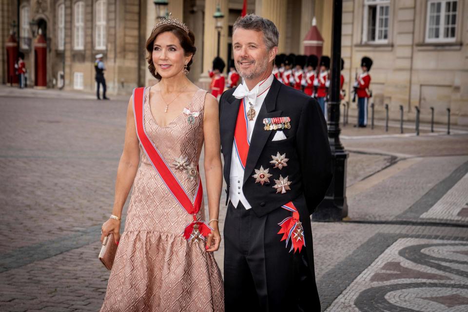 Denmark's Crown Prince Frederik and Denmark's Crown Princess Mary arrive ahead of a dinner at Amalienborg Castle in Copenhagen, on June 15, 2023. 