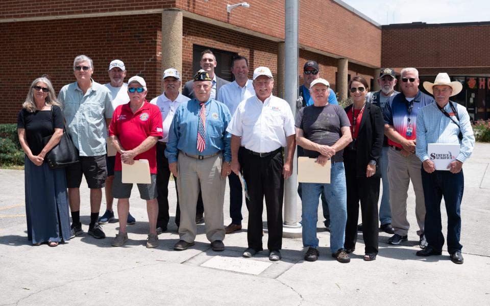 A large group gathered recently to discuss the monument that will be erected at Powell High School.