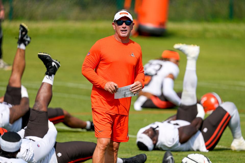 Cleveland Browns defensive coordinator Jim Schwartz watches warm ups at the team's training camp on July 29, 2023, in White Sulphur Springs, W.Va.