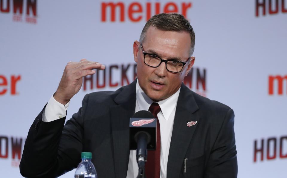 Steve Yzerman answers a question during an NHL hockey news conference where he was introduced as the new executive vice president and general manager of the Detroit Red Wings, Friday, April 19, 2019, in Detroit. Yzerman returns to Detroit where he was part of three Stanley Cup championship teams and a captain. (AP Photo/Carlos Osorio)