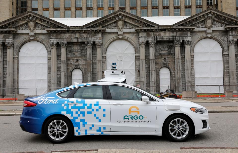 A Ford Argo AI test vehicle, being tested, drives through the downtown area in Detroit, Michigan on July 12, 2019. (Photo credit should read JEFF KOWALSKY/AFP via Getty Images)
