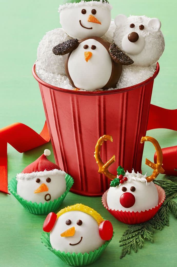 <p>If you're looking for a Christmas dessert that doubles as a fun <a href="https://www.womansday.com/life/g2054/christmas-activities-for-kids/" rel="nofollow noopener" target="_blank" data-ylk="slk:Christmas activity for the kids;elm:context_link;itc:0;sec:content-canvas" class="link ">Christmas activity for the kids</a>, look no further. They'll love making and decorating these adorable truffles. <br></p><p><em><a href="https://www.womansday.com/food-recipes/food-drinks/a25358417/snowy-cookie-truffles-recipe/" rel="nofollow noopener" target="_blank" data-ylk="slk:Get the recipe.;elm:context_link;itc:0;sec:content-canvas" class="link ">Get the recipe.</a></em></p>