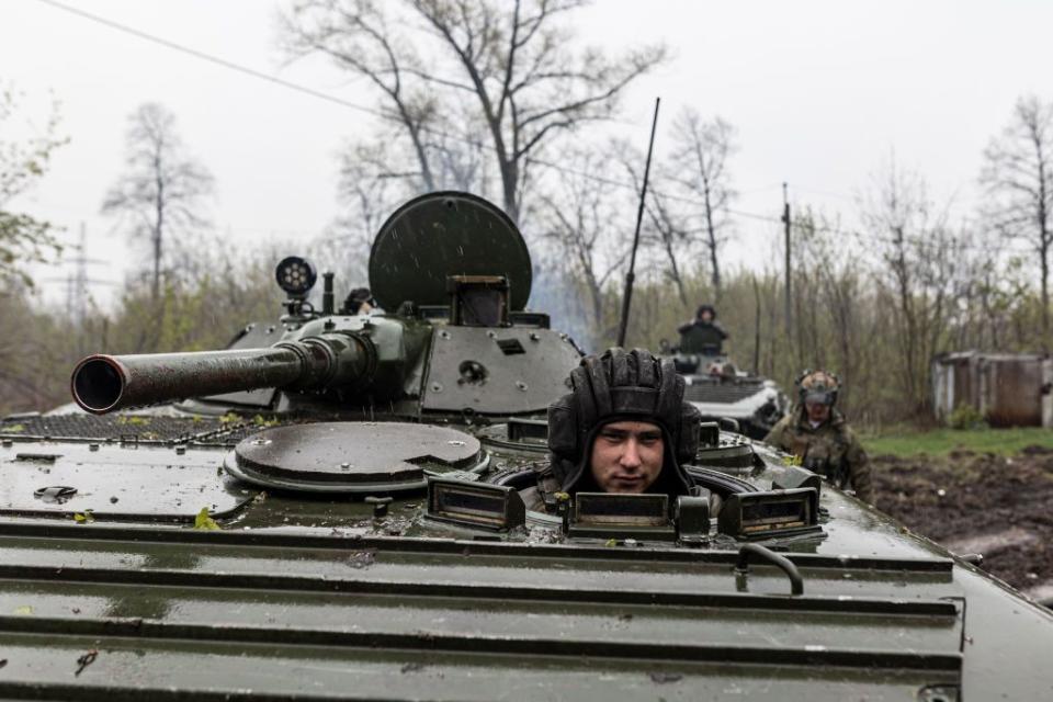 A Ukrainian soldier of the 57th Brigade is seen in a BMP infantry fighting vehicle near the front line in the direction of Bakhmut, in Donetsk Oblast, on April 20, 2023. (Diego Herrera Carcedo/Anadolu Agency via Getty Images)