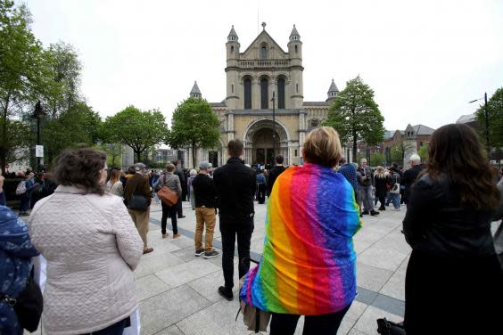 Mourners gather outside of St Anne's Cathedral in Belfast on April 24, 2019, during the funeral service of journalist Lyra McKee. (AFP/Getty Images)